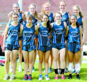 RAIDER XC TEAM â€” Taking a team photo Saturday as the 2015 Lake Region Invitational Champions, members of the Fryeburg Academy girlsâ€™ cross-country team include: bottom row, left to right, Costanza Santarelli, Irina Norkin, Anna Lastra, Olivia Thompson and Ella Charles; top row, Emily Carty, Zoe Maguire, Emily Grzyb, Emmajo Armington and Emily McDermith. 