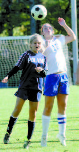 LAUREN JAKOBS of Lake Region battles a Poland player for the ball at midfield Saturday. (Rivet Photo)
