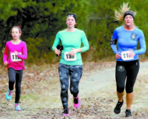 Runners (left to right) Alanna Nataluk of Lovell, Megan Hanson of South Paris and Elicia Tilsley of Green wood
