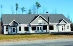 ANOTHER TO COME â€” Plans are in the making by Justin McIver for another similar-looking professional office building to be built to the left of this building at 300 Portland Road, which is leased by Ten Lakes Chiropractic.