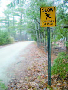THE CHILDREN AT PLAY sign was put up by the Town of Casco this fall. However, the selectmen decided not to petition the Maine Department of Transportation (MDOT) for a posted speed limit on Millstream Terrace because the sign wonâ€™t change behavior and enforcement of the law will be difficult. (De Busk Photo) 
