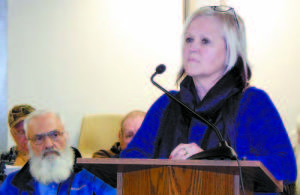 NOT HAPPY â€” Professional signmaker Sandra Swett told Bridgton Selectmen Tuesday the wayfaring signs produced by Nelle Ely were unprofessional and inferior, and urged the board not to install them.  