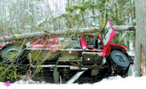 1 EXTENSIVE DAMAGE to the chassis of Harrisonâ€™s Engine 4 was clearly evident when it was returned to the fire station.   2 AFTER THE ICE SKATE â€” Engine 4 hit several trees after sliding down Harrison Heights Road Sunday following a fire call.  