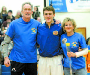 HOPING TO GO OUT IN STYLE — Jack is pictured here with his parents, Whit and Marybeth Lesure. SP w6 lr boys basketball preview SP w6 lr boys hoop preview #1 LAKE REGION (16-2) vs. #8 POLAND (9-10) Class B South Quarterfinal Saturday, Feb. 13, 4 p.m. Portland Expo Previous meetings • GM 12, 1/18/16, LR 82-POL 61 LR: Nate Smith, 24 points POL: Nathaniel Choiunard, 20 points • The Lakers did not play Oak Hill Lakers Points For: 1233, 68.5 ppg Points Against: 893, 49.6 ppg Leading scorers: Jack Lesure 15.9 ppg, Nate Smith 12.9, Marcus DeVoe 12.3, Brandon Palmer 5.7, Alex Langadas 5.4, Nick Wandishin 4.7 Longest win streak: 12 Road record: 8-1 (Poland 3-6, Oak Hill 2-7) Last game: The Lakers hammered Freeport 83-45; Poland thumped Oak Hill 72-48 in the preliminary game Coach’s Corner The News posed the following questions to Lake Region Head Coach John Mayo: Q. A couple of keys to playoff success? Coach Mayo: We need to continue to play good defense, rebound and set our tempo. Q. Two areas your team has improved the most? Coach Mayo: I think our half-court defense has improved over the course of the season. Toward the end of the season against tournament teams, we have been able to make it hard for teams to get the shots they are used to. We are playing better as a team. We are willing to share the ball with each other and trust each other on defense. Q. What are you most proud of regarding your team? Coach Mayo: This group has a common goal and they are willing to work together as a group to accomplish it. They push each other to be ready for the next opponent. They are a great group of guys that get along with each other. Class B South Bracket Quarterfinals At Portland Expo #1 Lake Region (16-2) vs. #8 Poland (9-10), 4 p.m. #2 Maranacook (16-2) vs. #7 Lisbon (10-8), noon #3 Yarmouth (13-5) vs. #6 Spruce Mountain (11-7), 10:30 a.m. #4 Lincoln Academy (8-10) vs. #5 Wells (9-9), 2:30 p.m. Semifinals At Cross Insurance Arena, Portland Thursday, Feb. 18 Maranacook-Lisbon winner vs. Yarmouth-Spruce winner, 7 p.m. Lake Region-Poland winner vs. Lincoln Academy-Wells winner, 8:30 p.m. Finals At Cross Insurance Arena, Portland Saturday, Feb. 20, 3:45 p.m. State Championship Friday, Feb. 26 Cross Insurance Arena, Bangor, 8:45 p.m.