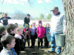 HOW IT ALL HAPPENS â€” George Weston of Weston's Farm in Fryeburg talks about sugaring to pre-schoolers.