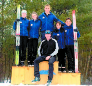 Pictured, left to right, L to R:  Zoe Maguire, Emily Carty, Patrick Carty, Irina Norkin and Seth Johnston; front, Coach John Weston 