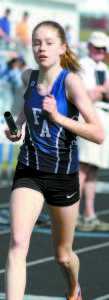 Zoe Maguire competes in the relay at the Western Maine Conference championships held at Lake Region. (Rivet Photos)