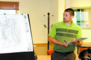 RICHARD DUNTON of Main-Land Development of Livermore Falls outlines aspects of the proposed Woods Pond Village project. (Rivet Photos)