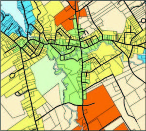 THE ADVENT OF ZONING â€” This draft Future Land Use Map for downtown Bridgton shows the Downtown Village Business Districts I and II, in green, extending along Main Street from Main Hill to the Kansas Road, and along Portland Road south to Willett Road, as well as a short distance north on Route 117. The yellow lots designate the Downtown Village Neighborhood; red, the Inner Corridor; and blue, the Lakeside Neighborhood. Lots shaded in pink designate the Rural Neighborhood. The map will be redone before the planned November vote so it will be easier to follow.   A WORK IN PROGRESS â€” Bridgton Selectman Glen â€œBearâ€ Zaidman discusses the draft Land Use Ordinance with Anne Krieg, Director of Planning, Economic and Community Development, at a June 16 public information meeting.