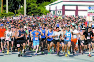 NEW RECORDS SET â€” The 40th running of the 4 on the Fourth produced new records â€” 2,071 completed the four miler, and 2,262 bibs were issued.