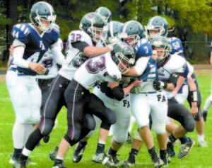 REFUSING TO GO DOWN â€” Cody Gullikson takes on nearly half of the Freeport defense.