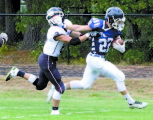 JARED CHISARI uses a strong stiff arm to break free from a Freeport defender for a touchdown. (Rivet Photos) FRYEBURG ACADEMY 35 First downs: 14 Penalties: 13 for 111 yards Turnovers: 1 Rushing: 41 carries, 289 yards Individual Rushing: Oscar Saunders 1-12, Cody Gullikson 20-117, Scott Parker 2-25, Jared Chisari 18-135 Passing: 8-15-76 Receiving: Cobey Johnson 3-47, Scott Parker 3-78, Cody Gullikson 1-7, Caleb Eklund 1-4 Total Yards: 365 yards Tackles (solo, assists, total): Tucker Buzzell 2-2-4, Scott Parker 1-1-2, Cody Gullikson 2-1-3, Josh Frye 0-2-2, Ryan Hewes 1-0-1, Kevin Ventura 1-1-2, Cobey Johnson 3-1-4, Caleb Bowles 2-1-3, Braydon Bartlett 1-0-1, Isaac Wakefield 2-1-3, Gage Fowler 0-2-2, Caleb Eklund 2-0-2, Cam Mailman 0-1-1, Tyreese Deloacth-Jeffrey 0-1-1, Reese Kneissler 0-1-1 Up next: The Raiders (3-2) travel to Poland this Friday to meet the Knights at 7 p.m. Poland is 1-4. The Raiders are currently ranked fifth in the Campbell Conference, just behind Spruce Mountain (103.5897 to 106.1538 in the Crabtree standings). Games remaining: Poland (1-4), Gorham (0-4) and Lake Region (1-4). â€œWe have to come to play (at Poland). We certainly have to play better than we did today,â€ Coach Turner said. FREEPORT 0 First downs: 1 (by penalty) Penalties: 6 for 60 yards Turnovers: 2 Rushing:14 carries, 24 yards Individual Rushing: Max Doughty 7-26, Cody Vachon 1-2, Connor Dostie 2-(minus 4), Josh Burke 4-0 Passing: 3 for 11, 12 yards Receiving: TJ Morrill 2-15, Max Doughty 1-(minus 3) Total Yards: 36 yards 