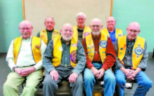 230 YEARS OF COMBINED SERVICE provided by longtime Bridgton Lions Club members (front, left to right) Steve Collins (33 years), Al Glover (58), Bob Pelletier (11), Dean Brown (33); (back row) Bob Hatch (33), Allen Hayes (35) and Bruce Jones (27).